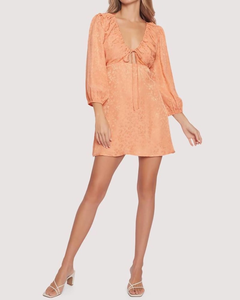 Front of a model wearing a size Large Beach Mini Dress In Peach in Peach by LOST + WANDER. | dia_product_style_image_id:346628